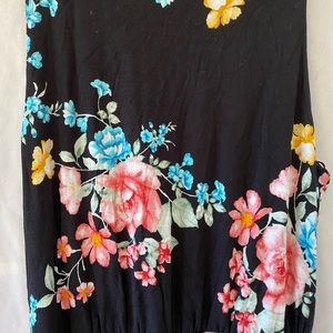 Sleeveless black and floral long dress.